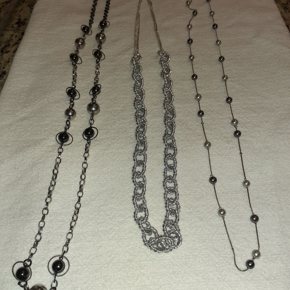 Set of three (3) silver and blue necklaces